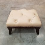 TH footstool, cream uph deep buttoned top view